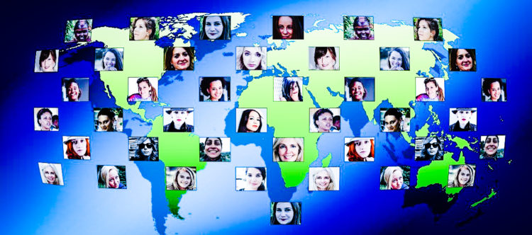 An image of the world, featuring the faces of women across the globe